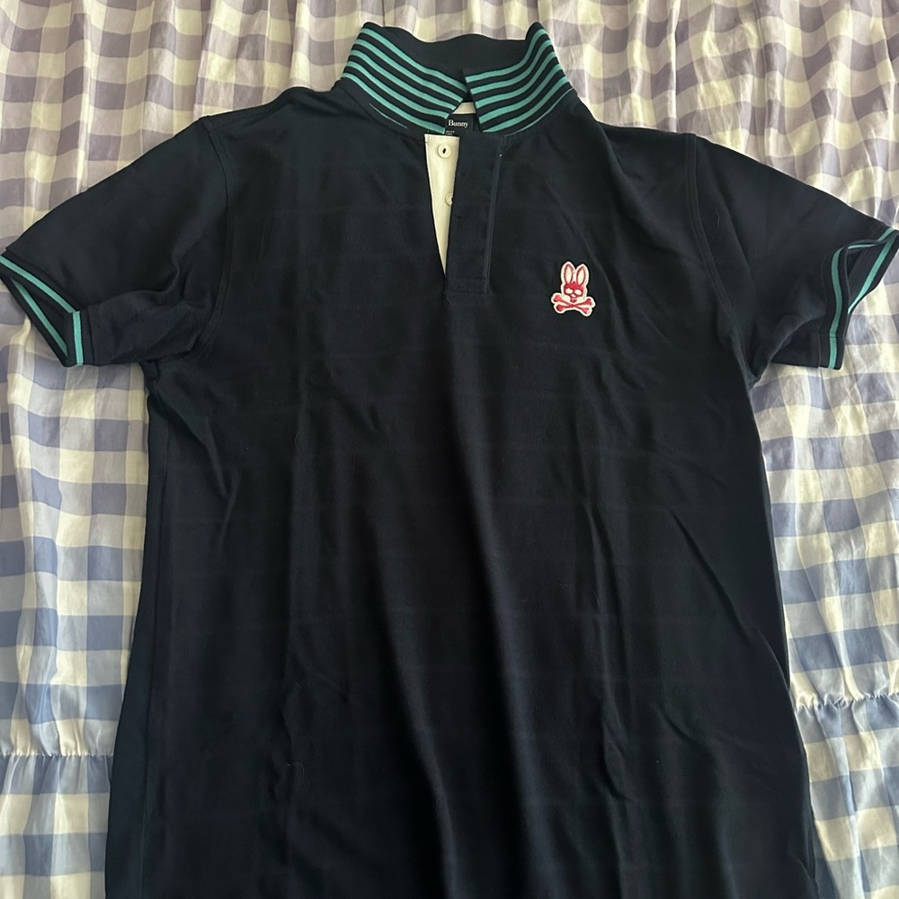 Men’s Psycho Bunny polo shirt.